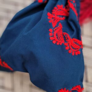 embroidered crimson pouch